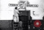 Image of Government's Oil Posters pasted on other companies oil posters Mexico, 1938, second 26 stock footage video 65675028791
