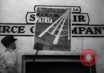 Image of Government's Oil Posters pasted on other companies oil posters Mexico, 1938, second 27 stock footage video 65675028791