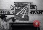 Image of Government's Oil Posters pasted on other companies oil posters Mexico, 1938, second 29 stock footage video 65675028791