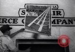 Image of Government's Oil Posters pasted on other companies oil posters Mexico, 1938, second 30 stock footage video 65675028791