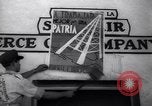 Image of Government's Oil Posters pasted on other companies oil posters Mexico, 1938, second 31 stock footage video 65675028791