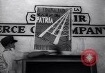 Image of Government's Oil Posters pasted on other companies oil posters Mexico, 1938, second 34 stock footage video 65675028791