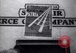 Image of Government's Oil Posters pasted on other companies oil posters Mexico, 1938, second 36 stock footage video 65675028791