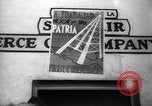 Image of Government's Oil Posters pasted on other companies oil posters Mexico, 1938, second 37 stock footage video 65675028791