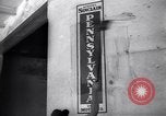 Image of Government's Oil Posters pasted on other companies oil posters Mexico, 1938, second 38 stock footage video 65675028791