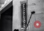 Image of Government's Oil Posters pasted on other companies oil posters Mexico, 1938, second 39 stock footage video 65675028791
