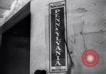 Image of Government's Oil Posters pasted on other companies oil posters Mexico, 1938, second 40 stock footage video 65675028791