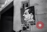 Image of Government's Oil Posters pasted on other companies oil posters Mexico, 1938, second 42 stock footage video 65675028791
