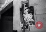 Image of Government's Oil Posters pasted on other companies oil posters Mexico, 1938, second 44 stock footage video 65675028791