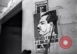 Image of Government's Oil Posters pasted on other companies oil posters Mexico, 1938, second 45 stock footage video 65675028791