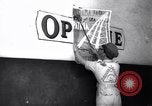 Image of Government's Oil Posters pasted on other companies oil posters Mexico, 1938, second 46 stock footage video 65675028791