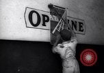 Image of Government's Oil Posters pasted on other companies oil posters Mexico, 1938, second 53 stock footage video 65675028791