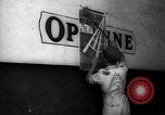 Image of Government's Oil Posters pasted on other companies oil posters Mexico, 1938, second 54 stock footage video 65675028791