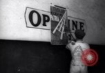 Image of Government's Oil Posters pasted on other companies oil posters Mexico, 1938, second 57 stock footage video 65675028791