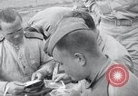 Image of US-Russian soldiers answer field telephones Kaesong Korea 38th Parallel, 1945, second 47 stock footage video 65675028818