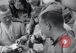 Image of US-Russian soldiers answer field telephones Kaesong Korea 38th Parallel, 1945, second 52 stock footage video 65675028818