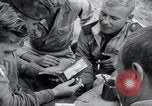 Image of US-Russian soldiers listen guitar Kaesong Korea 38th Parallel, 1945, second 7 stock footage video 65675028819