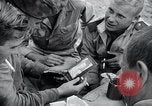 Image of US-Russian soldiers listen guitar Kaesong Korea 38th Parallel, 1945, second 8 stock footage video 65675028819
