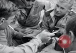 Image of US-Russian soldiers listen guitar Kaesong Korea 38th Parallel, 1945, second 9 stock footage video 65675028819
