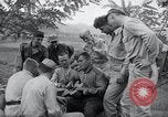 Image of US-Russian soldiers listen guitar Kaesong Korea 38th Parallel, 1945, second 25 stock footage video 65675028819