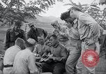 Image of US-Russian soldiers listen guitar Kaesong Korea 38th Parallel, 1945, second 26 stock footage video 65675028819