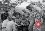 Image of US-Russian soldiers listen guitar Kaesong Korea 38th Parallel, 1945, second 27 stock footage video 65675028819