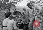 Image of US-Russian soldiers listen guitar Kaesong Korea 38th Parallel, 1945, second 32 stock footage video 65675028819