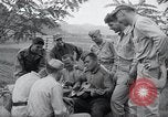 Image of US-Russian soldiers listen guitar Kaesong Korea 38th Parallel, 1945, second 33 stock footage video 65675028819