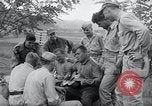 Image of US-Russian soldiers listen guitar Kaesong Korea 38th Parallel, 1945, second 36 stock footage video 65675028819