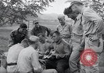 Image of US-Russian soldiers listen guitar Kaesong Korea 38th Parallel, 1945, second 37 stock footage video 65675028819