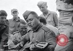 Image of US-Russian soldiers listen guitar Kaesong Korea 38th Parallel, 1945, second 41 stock footage video 65675028819