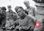 Image of US-Russian soldiers listen guitar Kaesong Korea 38th Parallel, 1945, second 42 stock footage video 65675028819
