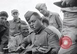 Image of US-Russian soldiers listen guitar Kaesong Korea 38th Parallel, 1945, second 43 stock footage video 65675028819