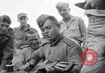Image of US-Russian soldiers listen guitar Kaesong Korea 38th Parallel, 1945, second 44 stock footage video 65675028819