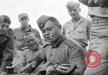 Image of US-Russian soldiers listen guitar Kaesong Korea 38th Parallel, 1945, second 45 stock footage video 65675028819