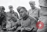 Image of US-Russian soldiers listen guitar Kaesong Korea 38th Parallel, 1945, second 46 stock footage video 65675028819