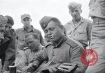 Image of US-Russian soldiers listen guitar Kaesong Korea 38th Parallel, 1945, second 48 stock footage video 65675028819