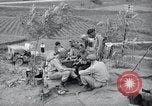 Image of US-Russian soldiers listen guitar Kaesong Korea 38th Parallel, 1945, second 60 stock footage video 65675028819