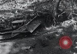 Standbild Bulldozer löscht Straße Birma, 1943, aus Sekunde 5 historischem Filmmaterial Videoclip 65675028820