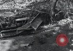 Standbild Bulldozer löscht Straße Birma, 1943, aus Sekunde 6 historischem Filmmaterial Videoclip 65675028820