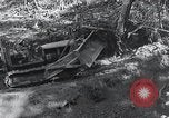 Standbild Bulldozer löscht Straße Birma, 1943, aus Sekunde 7 historischem Filmmaterial Videoclip 65675028820
