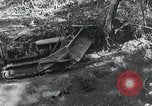 Standbild Bulldozer löscht Straße Birma, 1943, aus Sekunde 8 historischem Filmmaterial Videoclip 65675028820