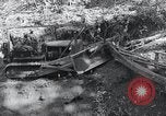Standbild Bulldozer löscht Straße Birma, 1943, aus Sekunde 18 historischem Filmmaterial Videoclip 65675028820