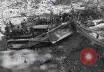 Standbild Bulldozer löscht Straße Birma, 1943, aus Sekunde 20 historischem Filmmaterial Videoclip 65675028820