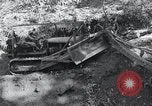 Standbild Bulldozer löscht Straße Birma, 1943, aus Sekunde 21 historischem Filmmaterial Videoclip 65675028820