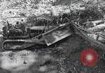 Standbild Bulldozer löscht Straße Birma, 1943, aus Sekunde 22 historischem Filmmaterial Videoclip 65675028820