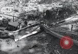 Standbild Bulldozer löscht Straße Birma, 1943, aus Sekunde 26 historischem Filmmaterial Videoclip 65675028820