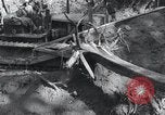 Standbild Bulldozer löscht Straße Birma, 1943, aus Sekunde 28 historischem Filmmaterial Videoclip 65675028820
