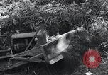 Standbild Bulldozer löscht Straße Birma, 1943, aus Sekunde 34 historischem Filmmaterial Videoclip 65675028820