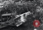 Standbild Bulldozer löscht Straße Birma, 1943, aus Sekunde 35 historischem Filmmaterial Videoclip 65675028820